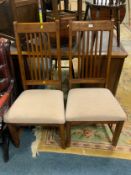 A pair of hardwood modern chairs