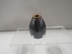 A small Martin Bros pinch vase dated 1910, signed martin Bros, London Southall on base