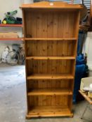 A modern floor standing open pine bookcase H 195 cm W 88 cm