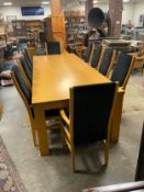 A huge oak kitchen/boardroom table with ten upholstered armchairs H 79 cm W 113 cm L 292 cm