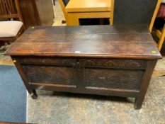 An antique oak two panel coffer W 122 cm