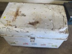 A steel travel trunk and contents to include a tilley lamp and a fire grate front