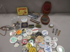 A vintage mahogany travelling mirror, enamel badges etc