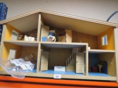 A vintage dolls house with contents A/F together with a vintage Triang baby walker brick set A/F