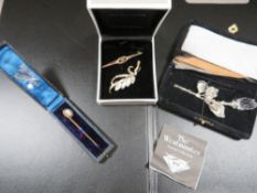 A 9ct rose gold brooch together with a cameo stick pin in original box and two modern costume