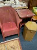 A vintage Lloyd Loom chair with a table and linen bin. (3)