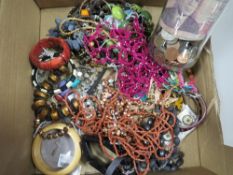 A jar of coins and banknotes and a quantity of jewellery