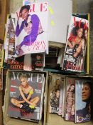 A quantity of Vogue magazines