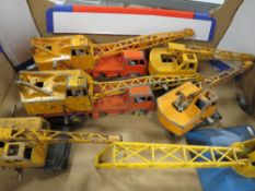 Six unboxed vintage Dinky cranes/mobile cranes