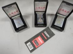 Three boxed zippo RAF squadron lighters 51st, 26th squadrons and Goose bay (3) and a new wick in