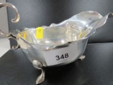 A hallmarked silver sauce boat - spilt by handle approx. weight 179g