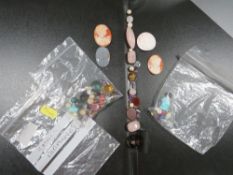 A quantity of gemstones and cameos
