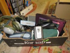 A tray of electricals to include two aircraft headsets, a BOSE soundlink, a Cambridge