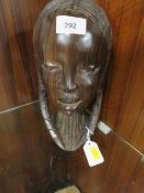A vintage African ironwood head carving
