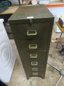 A six drawer green steel filing / storage cabinet