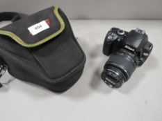 A Nikon d40x camera and lenses with bag