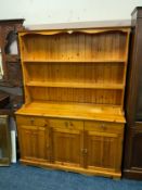 A honey pine kitchen dresser W 138 cm