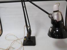 A vintage angle poise style desk lamp