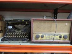 An antique underwood number 5 typewriter together with a vintage radio A/F