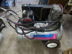A Cambell Hausfeld power pro air compressor