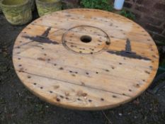 A scratch built round storage table