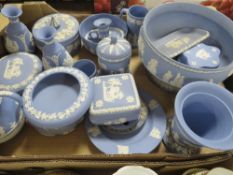 A tray of assorted blue Wedgwood jasperware to include an imperial bowl