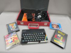 A vintage Sinclair ZX Spectrum 48K together with a many games (unchecked)