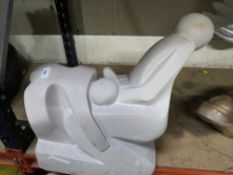 A white stone type statue of an erotic nature - H 40 cm, W 40 cm