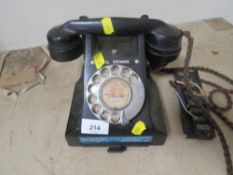 A vintage exchange telephone with pull out index