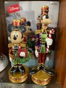A set of Christmas Disney Mickey Mouse and Goofy nutcracker figures with lights and music, boxed new