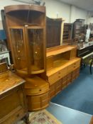 A mid century teak wall cabinet W 153 cm, together with a corner cabinet. (2)