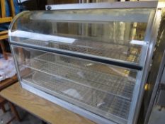 A glass table top food storage warmer / display unit