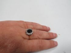 A hallmarked 9ct gold sapphire and diamond ring, approx weight 2.1 g