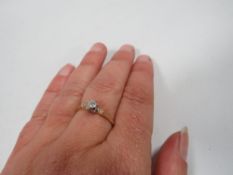 An 18ct illusion set diamond solitaire ring approx. weight 2.8g