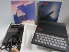 A boxed Sinclair ZX81 in original box with instruction manual etc