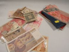 A box of old coins and banknotes