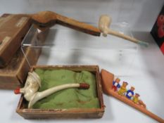 A tray of assorted collectables to include novelty pipes, cigarette lighters etc