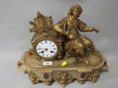 An ornate French style gilt mantle clock