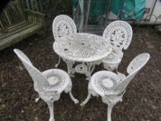A cast aluminium garden set comprising table and four chairs