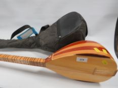 A Moroccan musical instrument with carry case