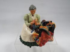 A Royal Doulton figurine 'The Wardrobe Mistress' HN2145
