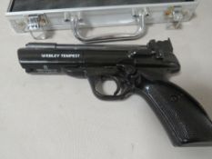 A Wembley Tempest air pistol in hard shell case