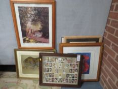 A collection of framed pictures to include an early set of framed cigarette cards depicting