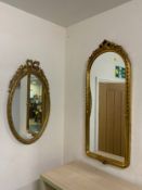 Three modern gilt wall mirrors including an oval example. (3)
