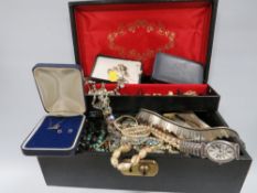 A costume jewellery box with contents