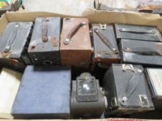 A tray of vintage box cameras