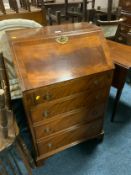 A small Ladies mahogany crossbanded bureau W 62 cm