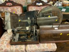 Two vintage Deco style wall mirrors and a singer sewing machine