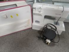 A Riccar Ruby 7124 sewing machine (unchecked)