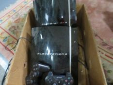 A box of PlayStation 3 consoles to include controllers etc